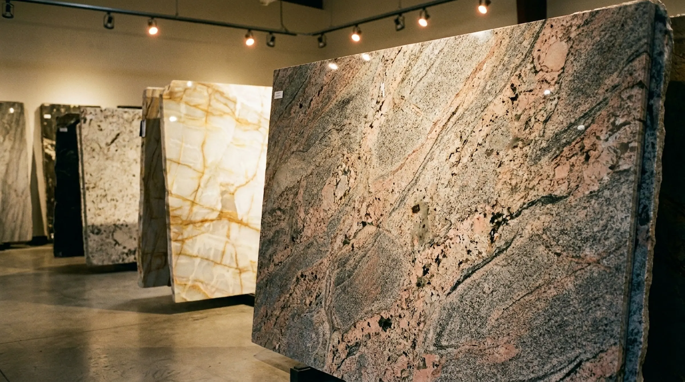 Granite and quartzite slab selection at E & D Stoneworks showroom in Lafayette